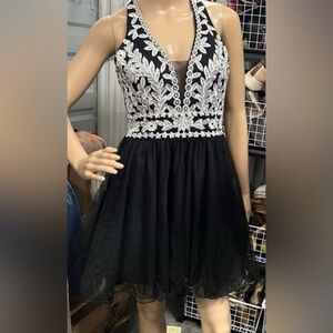 Blondie Nites Black / White Sequin top Backless Dress with plunging neckline